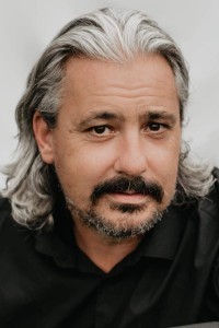 John Alan Roberts as Dancing Maharaja (uncredited) in Cinderella (09/2021)