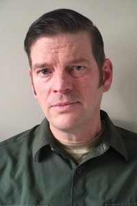 Rich Lawton as Marine Officer in The Old Guard (07/2020)