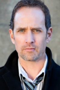 Robert Moloney as News Show Host in Man of Steel (06/2013)