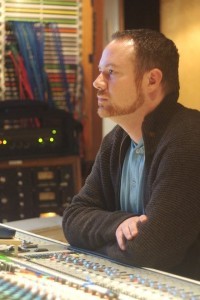 Casey Stone as Scoring Mixer in Gunpowder Milkshake (07/2021)