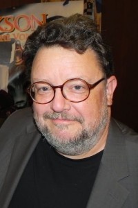 Roger L. Jackson as Ghostface (voice) in Scream (12/1996)