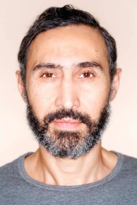 Umit Ulgen as Train Guard in Spectre (10/2015)