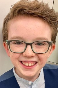 Aidan McCann as Market Boy in Disenchanted (11/2022)