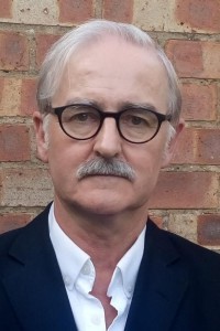 Martyn Mayger as Office worker in The Old Guard (07/2020)