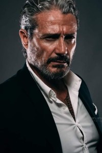 Bruno Verdirosi as Gianna's Bodyguard (uncredited) in John Wick: Chapter 2 (02/2017)