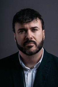 John Wolfe as Guard (uncredited) in Cruella (05/2021)