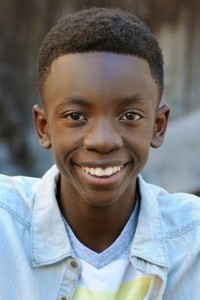 Roland Kilumbu as Young Militant in Black Panther (02/2018)
