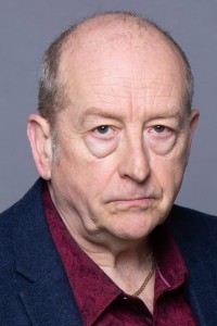 Ian Bartholomew as Bakker in Operation Fortune: Ruse de Guerre (01/2023)