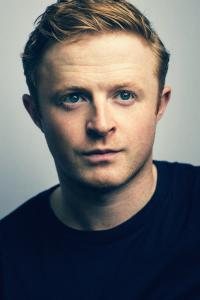 Conor MacNeill as Bodhi - IT Specialist in Operation Fortune: Ruse de Guerre (01/2023)