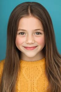 Alice Comer as Clara in Detective Knight: Redemption (12/2022)