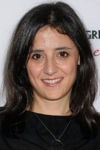 Belén Atienza as Producer in Society of the Snow (12/2023)