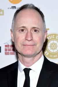 Tom MacDougall as Executive Music Producer in Strange World (11/2022)