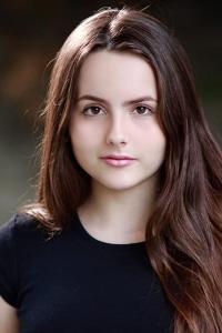 Ava Acres as Young Lisa Jobs (uncredited) in Jobs (08/2013)