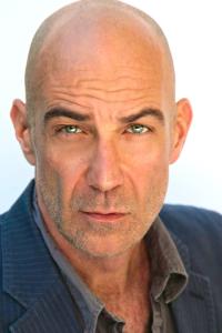 David Dayan Fisher as Shoe Shine Man at GSE in The Dark Knight Rises (07/2012)