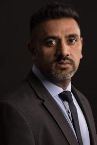 Hiten Patel as Office Executive (uncredited) in Paddington 2 (11/2017)
