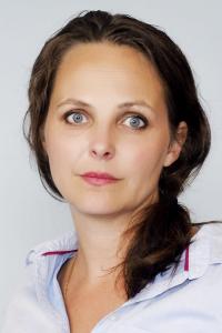 Cecilie A. Mosli as Processor #1 in What Happened to Monday (08/2017)