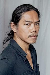 Teerawat Mulvilai as Boonmee in The Creator (09/2023)