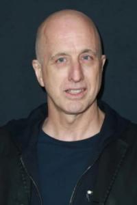 James McTeigue as First Assistant Director in The Matrix (03/1999)