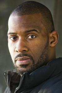 Isaac Stephen Montgomery as MP #1 in The Gray Man (07/2022)