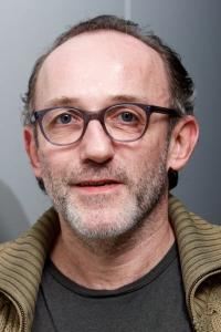 Karl Markovics as Wolf in The Grand Budapest Hotel (02/2014)