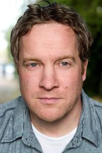 Grant Burgin as Operator in V for Vendetta (02/2006)