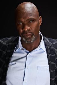Simo Mogwaza as MNU Mercenary in District 9 (08/2009)
