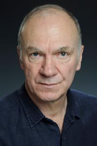 Derek Hutchinson as Bureaucrat in V for Vendetta (02/2006)