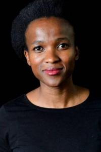 Sibulele Gcilitshana as Ü Günters Woman in District 9 (08/2009)