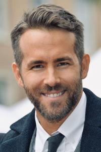 Ryan Reynolds as Clint Briggs in Spirited (11/2022)