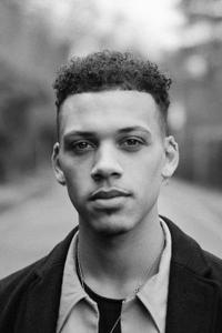 Jordan Bolger as Malik in The Woman King (09/2022)