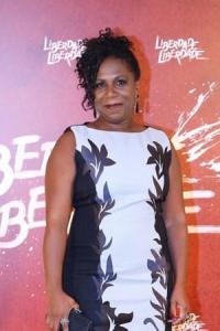 Ju Colombo as Quintilha Chagas in Season 1 (08/2022)