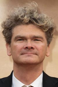 Simon Farnaby as Basil, Zoo Security Guard in Wonka (12/2023)