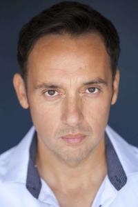Seth Michaels as Souvenir Stand Owner in Red Notice (11/2021)