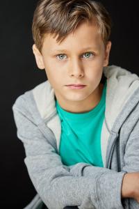 Bentley Hughes as Hero Beau's Young Son in Beau Is Afraid (04/2023)