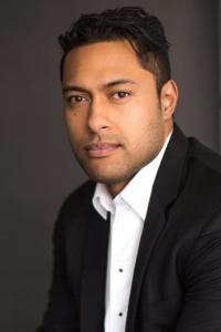 Uli Latukefu as The Champion in Black Adam (10/2022)