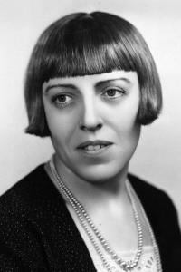 Dodie Smith as Novel in Cruella (05/2021)