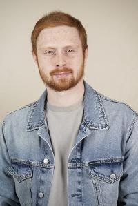 Josh Cronin as Production Coordinator in The Holdovers (10/2023)