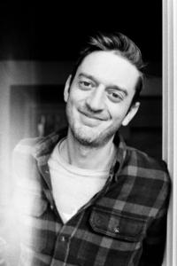 Fraser Ash as Associate Producer in The Man Who Invented Christmas (10/2017)