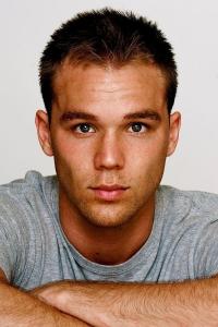 Lincoln Lewis as Young Airman in Land of Bad (01/2024)