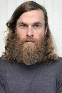 Elijah Ungvary as Ericksen in What Happened to Monday (08/2017)
