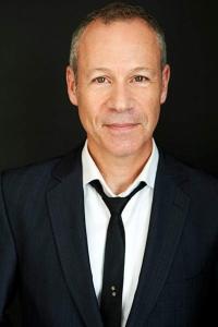 Adrian Griffin as Reporter #2 in In the Shadow of the Moon (09/2019)