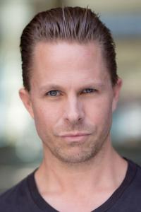 Grayson Berry as Officer Mike in Vengeance (07/2022)