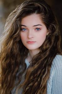 Erika Bierman as Snow's Granddaughter in The Hunger Games: Catching Fire (11/2013)