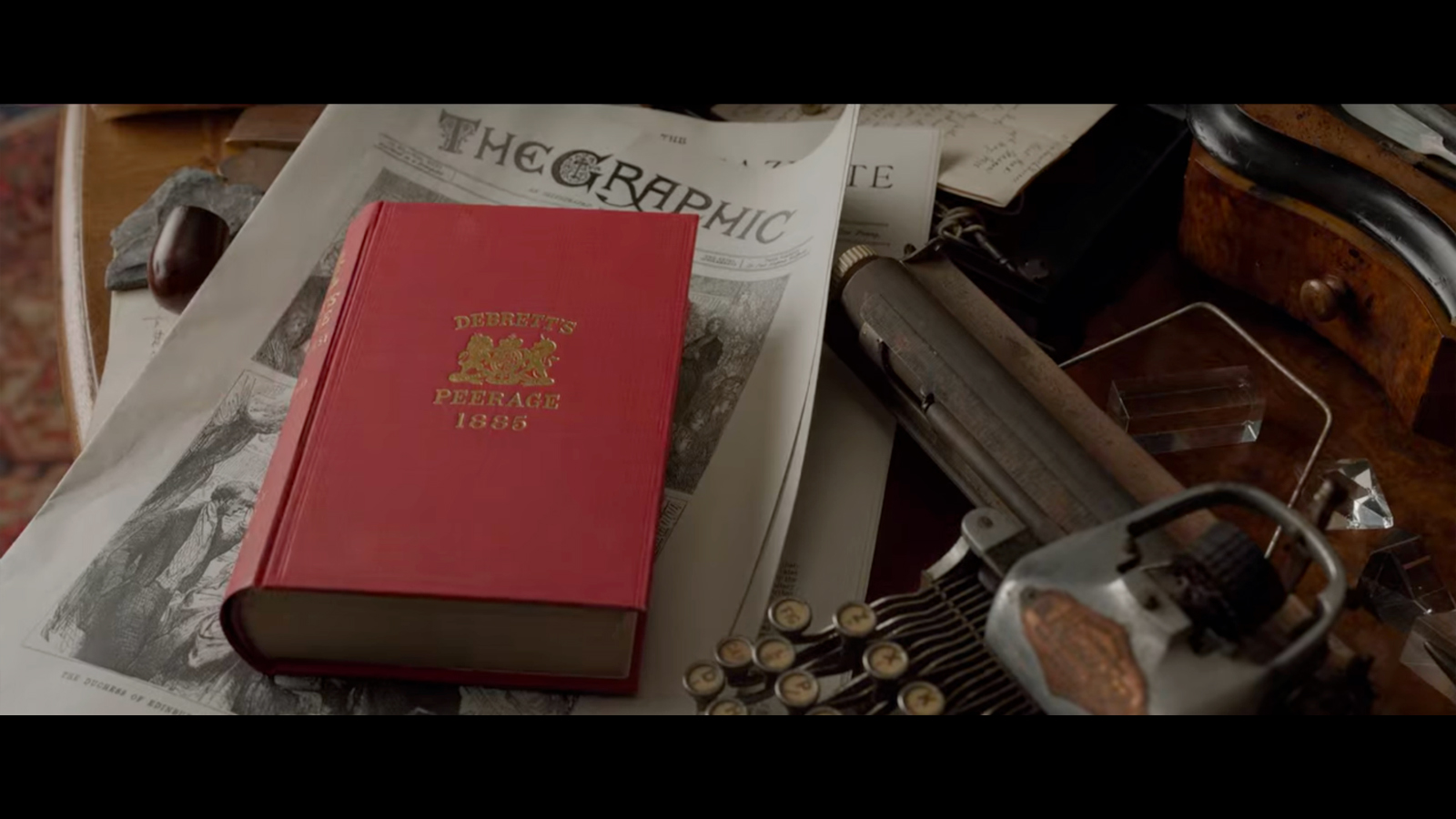 Enola at Sherlock's desk